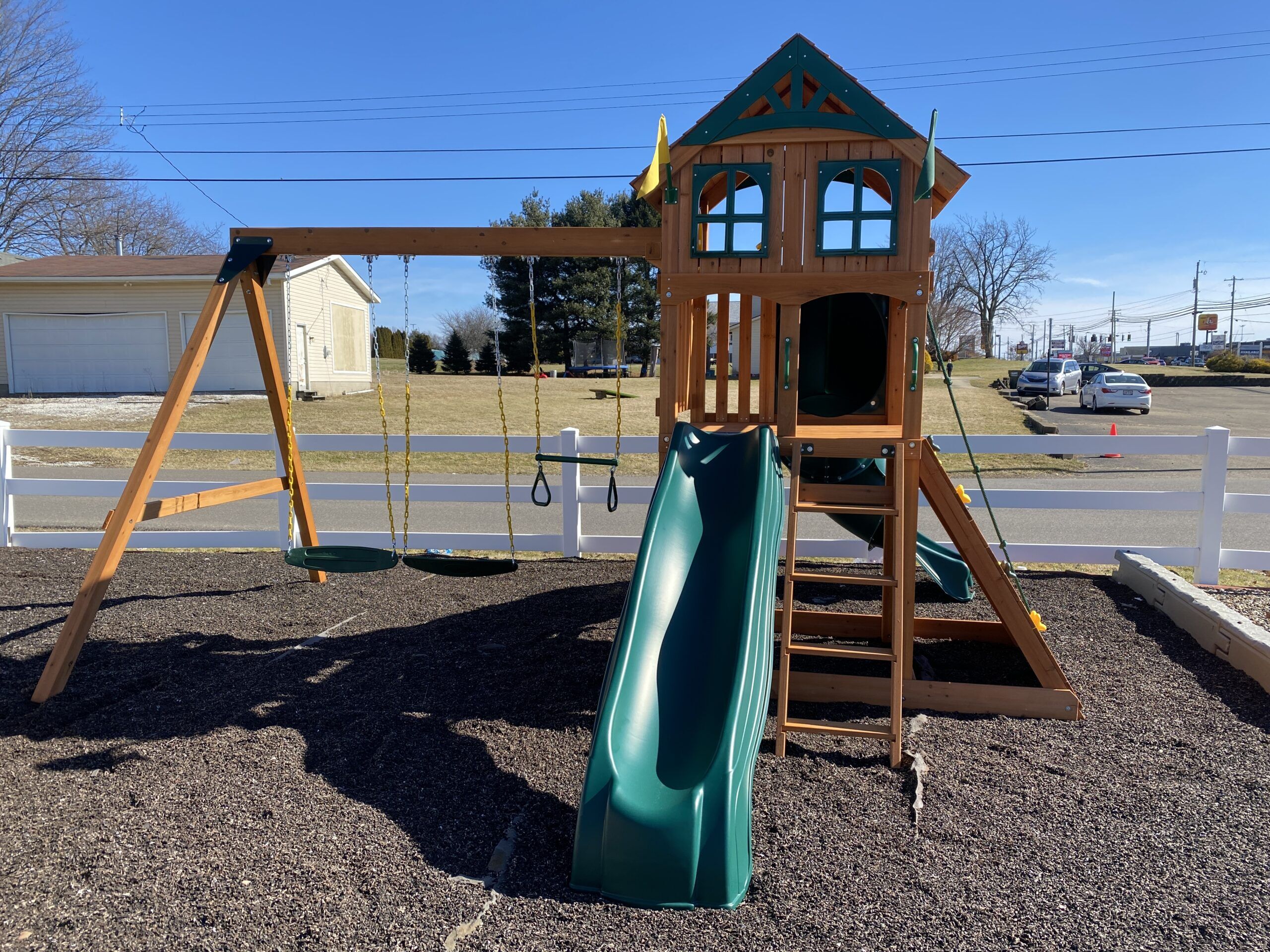 wooden swing set with tube slide