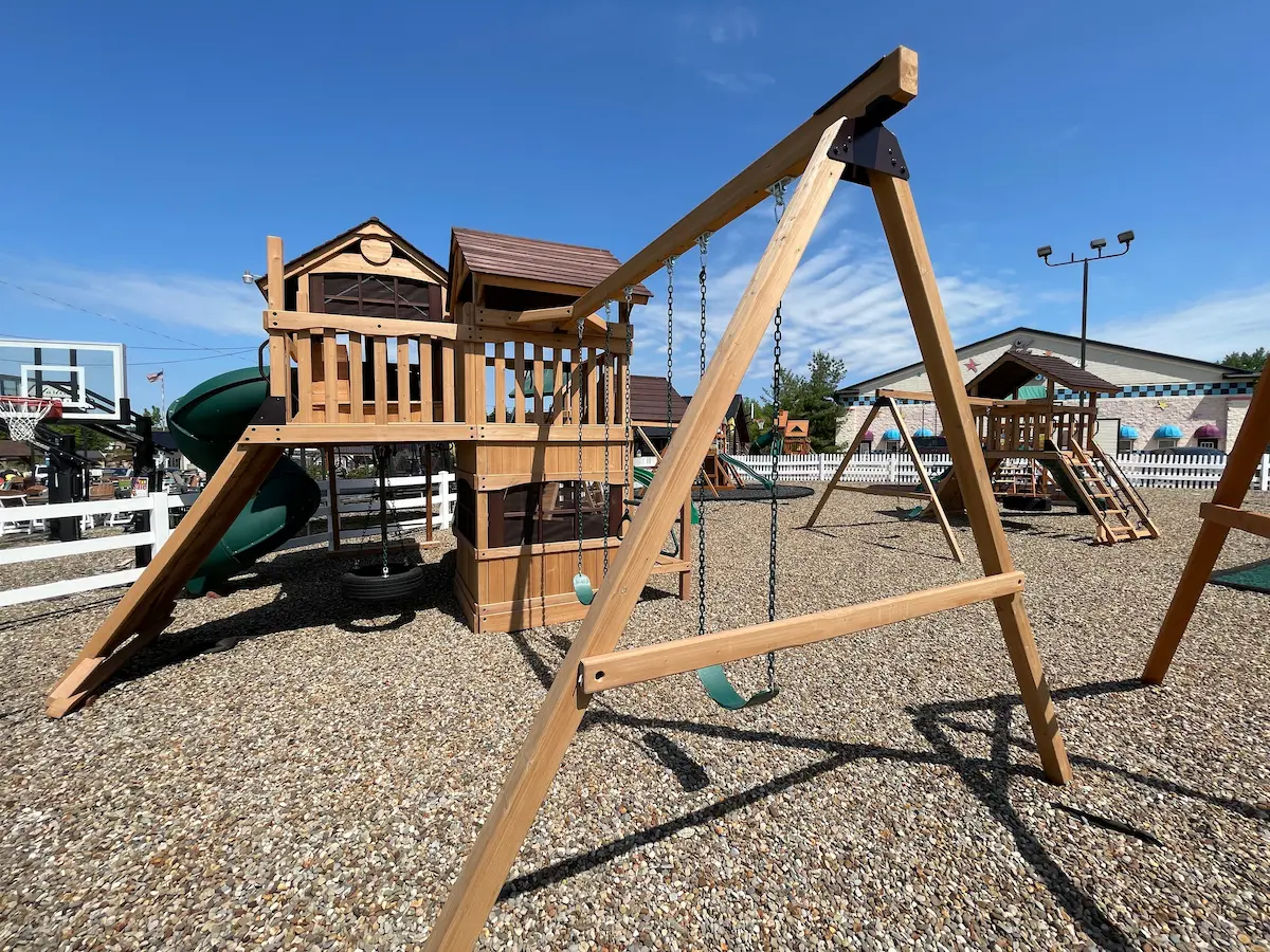 outdoor wooden swing sets with slides