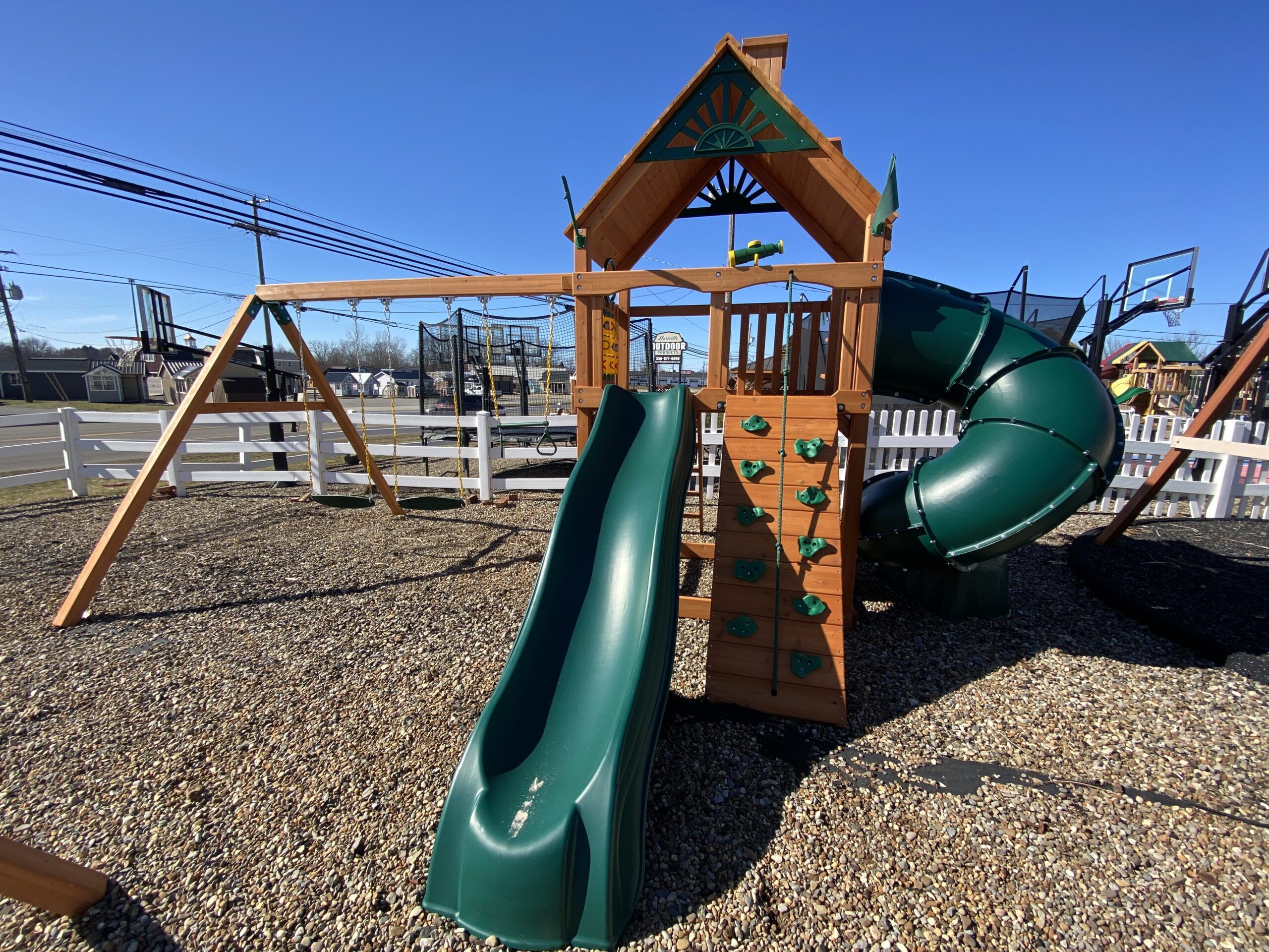 swing set with spiral slide and tube slide
